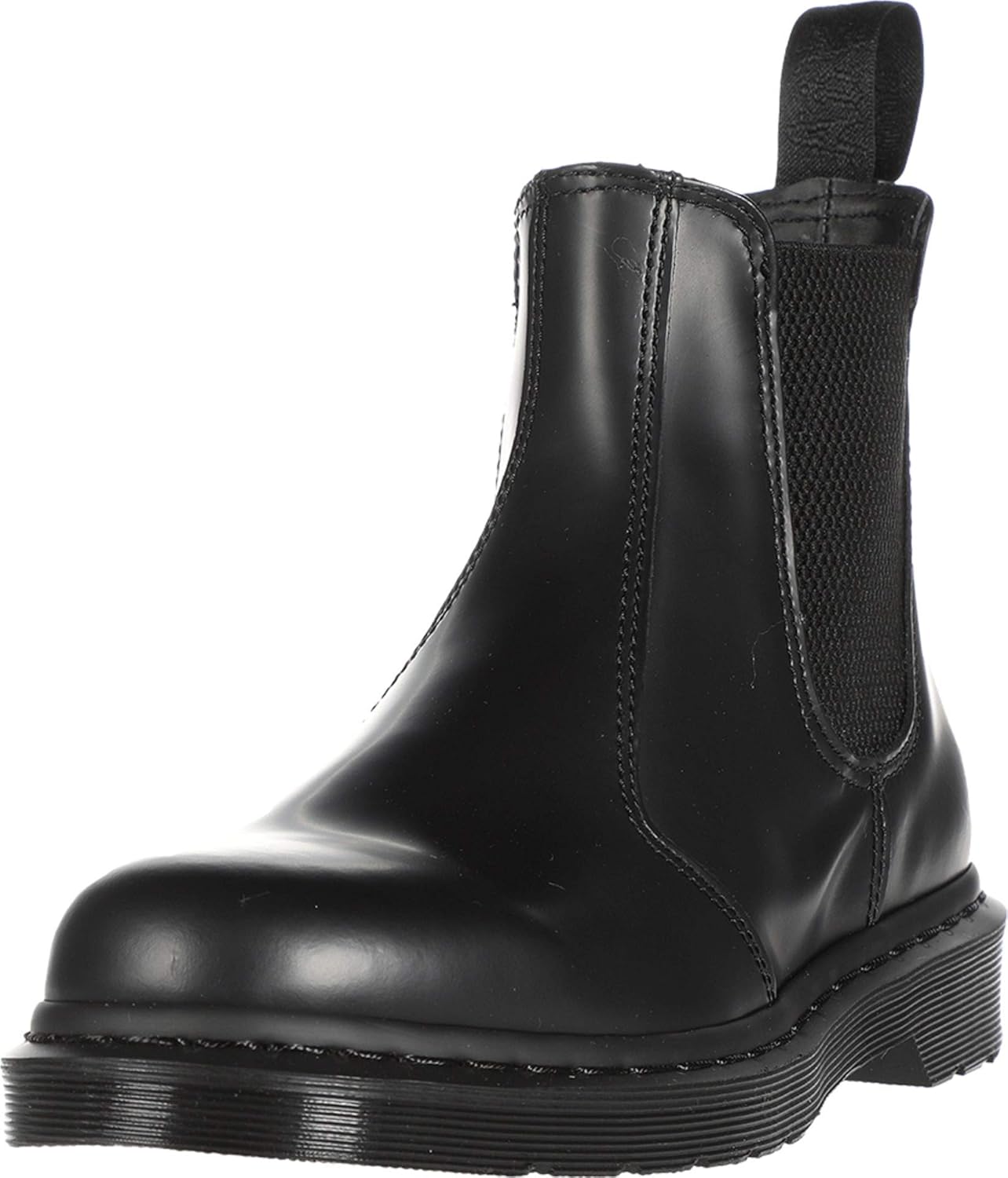 Bottes Chelsea Dr Martens 2976 Mono cuir lisse homme portées avec un jean dans un contexte urbain